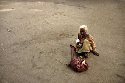 When foreign tourists come to visit India, many of them are shocked by the numbers of poor people and beggars on the streets of the large cities such as with the woman photographed in Nashik in Maharasthra in India. Read about it in this archive story.