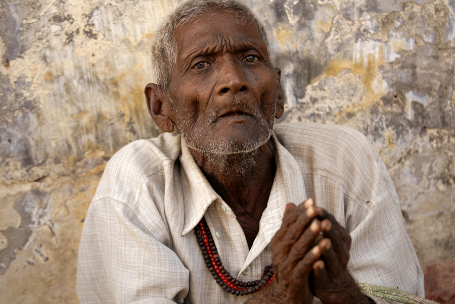 Raising the living standards of India's poor has been high on the agenda for governments since Independence. However, India presently has one of the world's highest concentrations of poverty, with an estimated 350 million, and growing, Indians living below the poverty line. In this photograph an Indian man is portrayed in Sarnath, India.